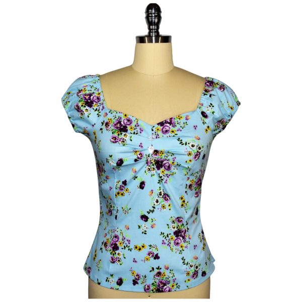 Siren Clothing 50's vintage-inspired top with elasticated short sleeves and front pleat detail in blue floral cotton spandex fabric