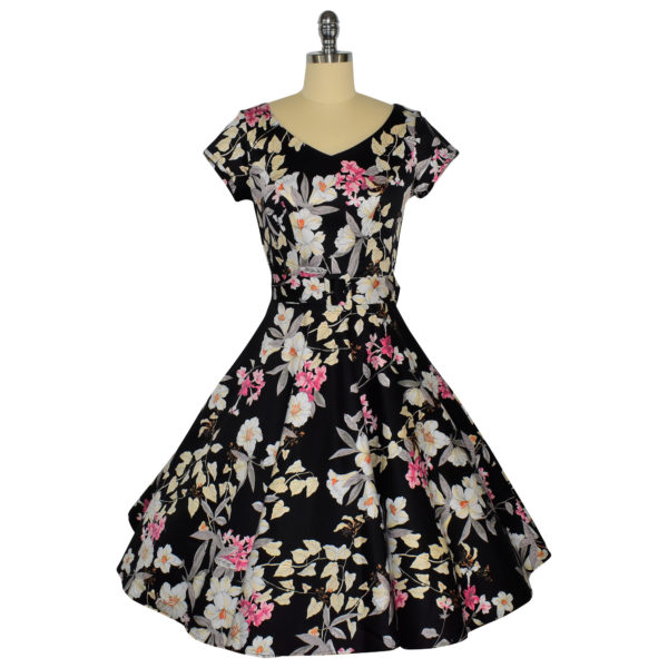 Siren Clothing 50's vintage-inspired swing dress with short sleeves in black and pink floral fabric.